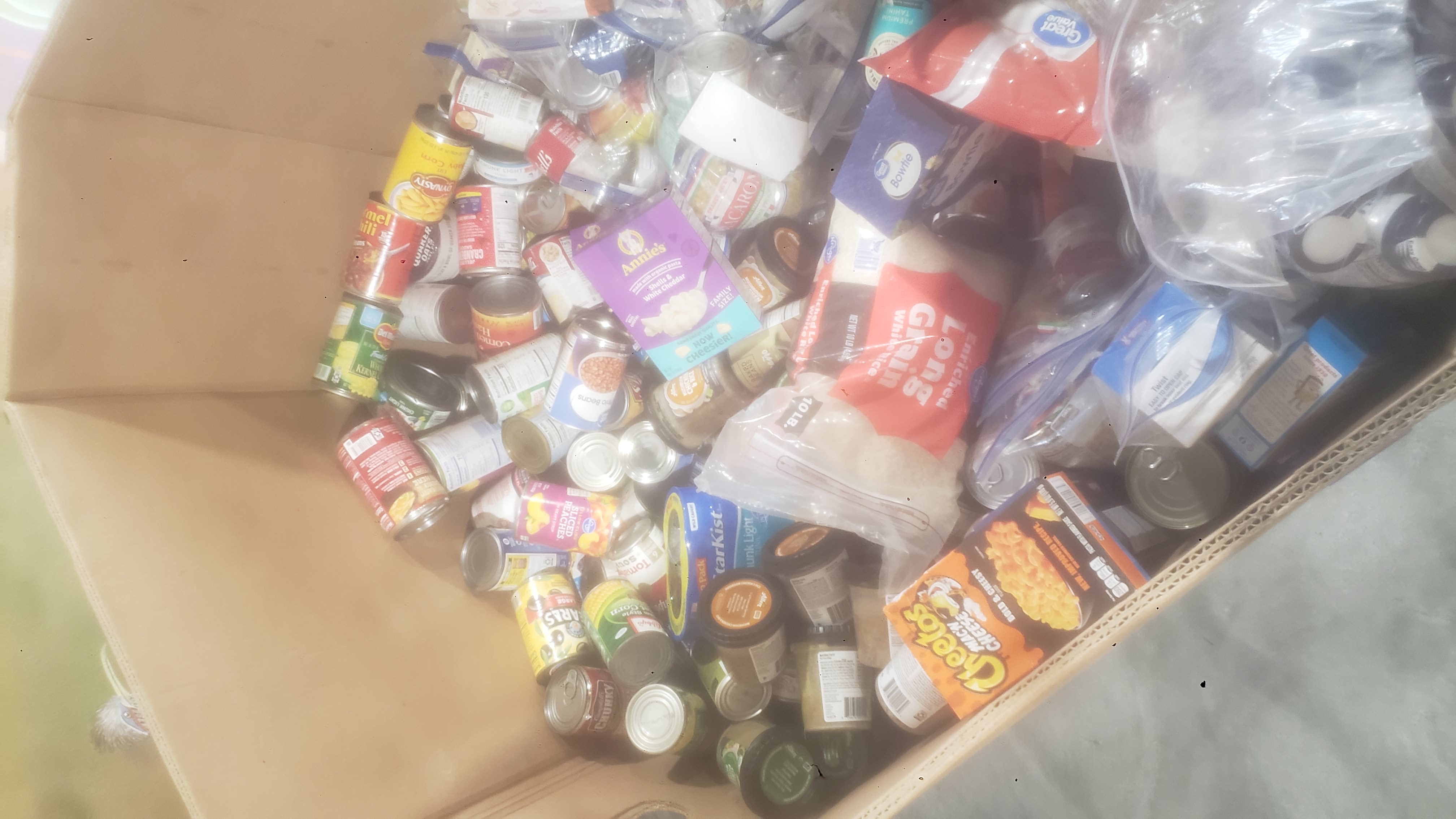 Cardboard container full of food.